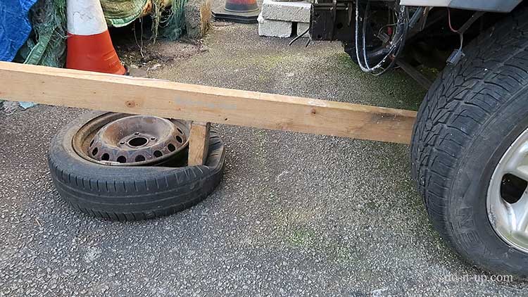Breaking the Tyre Bead Using Two Pieces of Wood and Another Vehicle