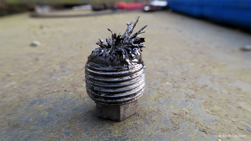 Magnetic Oil Drain Sump Plug (With Trapped Metal Burrs and Filings)