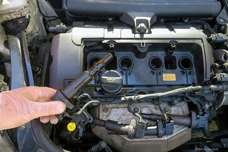 Oil Leaks - The Camshaft Cover Ignition Coil & Spark Plugs Holes (This example is fitted to a 1.6 Litre Petrol Engine, BMW, Citroën, Mini & Peugeot)