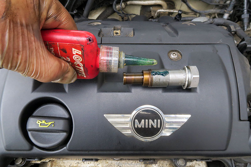 Oil Leaks - The Timing Chain Tensioner (Applying Threadlocker) (This example is fitted to a 1.6 Litre Petrol Engine, BMW, Citroën, Mini & Peugeot)